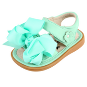 Ready Set Bow Sandal | Toddler Squeaky Shoes | mooshu TRAINERS | Hooray for sandal weather! Our Ready Set Bow Sandals combine the perfect mix of style and functionality. The flexible sole provides comfort for walking along the boardwalk, still allowing the feet to breathe while showing off those teeny tiny pedicures.
