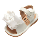 Ready Set Bow Sandal | Toddler Squeaky Shoes | mooshu TRAINERS | Hooray for sandal weather! Our Ready Set Bow Sandals combine the perfect mix of style and functionality. The flexible sole provides comfort for walking along the boardwalk, still allowing the feet to breathe while showing off those teeny tiny pedicures.