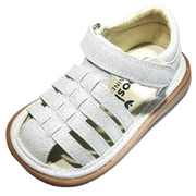 Sunny Pearl | Toddler Squeaky Shoes | mooshu TRAINERS | Everyone needs a strappy sandal. Whether you are planning a trip to the library or dancing your heart away at a wedding, Sunny is the perfect all occasion shoe. The pearl shimmer adds the perfect amount of DAZZLE. 
