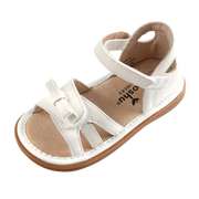 Marilyn Strappy Sandal | Toddler Squeaky Shoes | mooshu TRAINERS | Every little girl needs a strappy sandal. Whether you are planning a trip to the zoo or dancing your heart away at a wedding, Marilyn is the perfect all occasion shoe. The closed heel detail adds support and comfort. Available in White, Silver, Gold & Pink